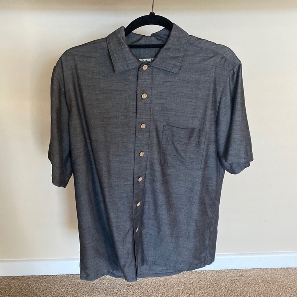 Medium colored shirt. Like new. Has slight sheen to it. Great condition like new